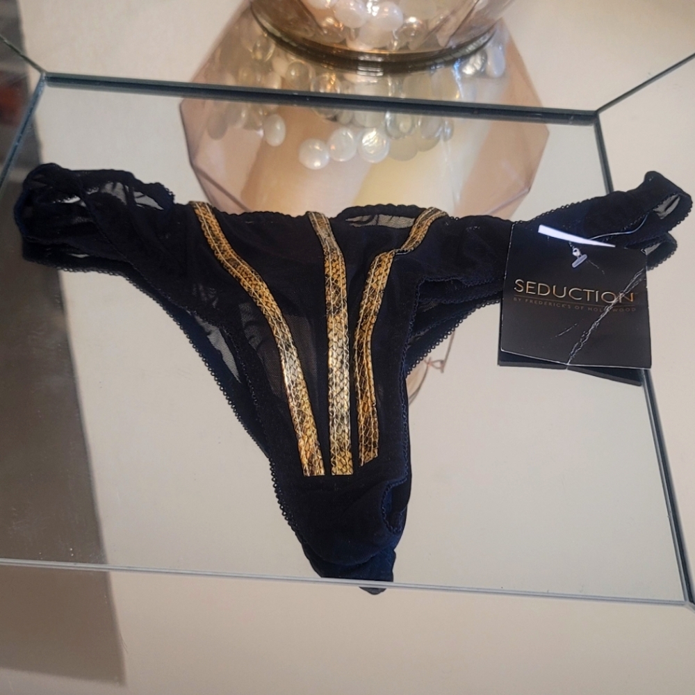 Black with gold snake skin 3 stripe design  Fredericks of Hollywood thong